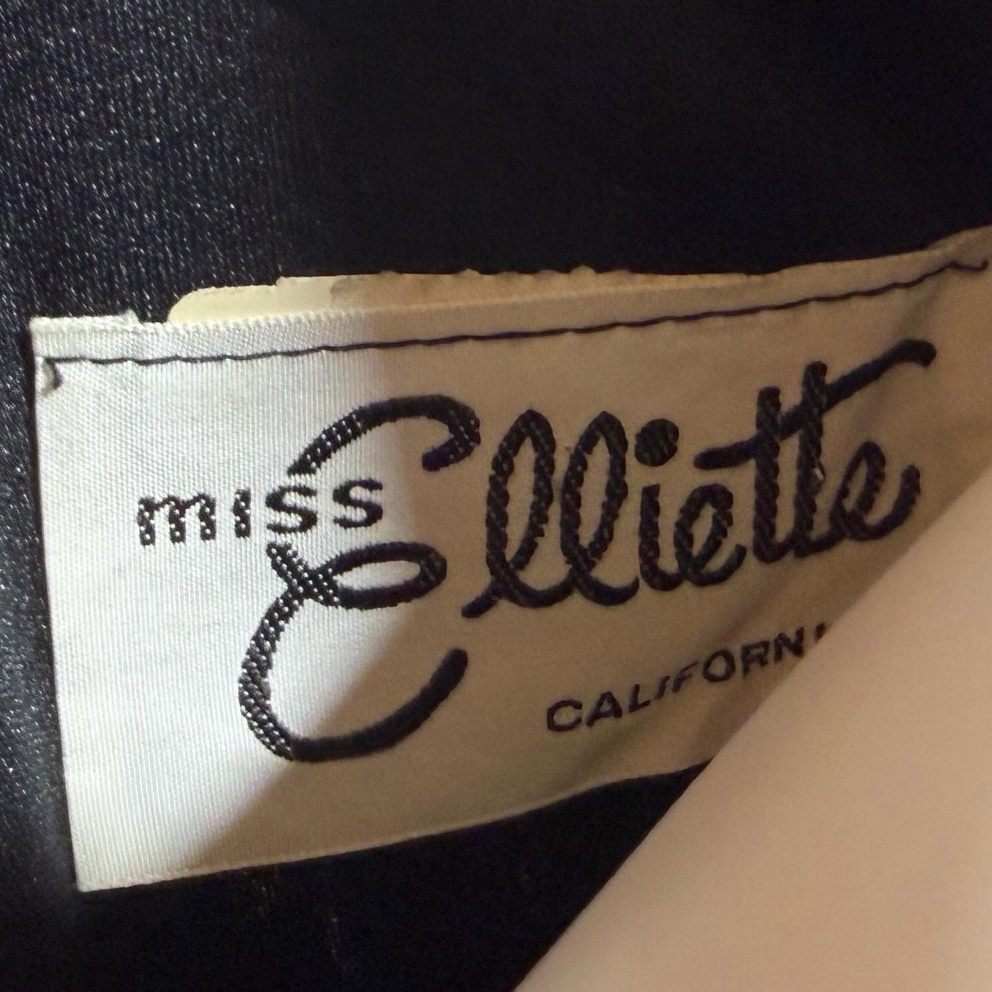 vintage 1970s MISS ELLIETTE evening dress, black jersey knit wrap dress with fringe Medium