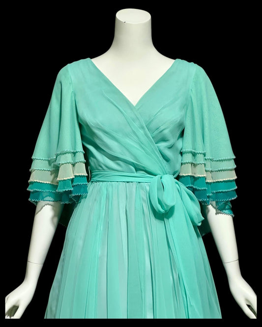JACK BRYAN, vintage 1970s teal green chiffon evening dress with beaded flutter sleeves