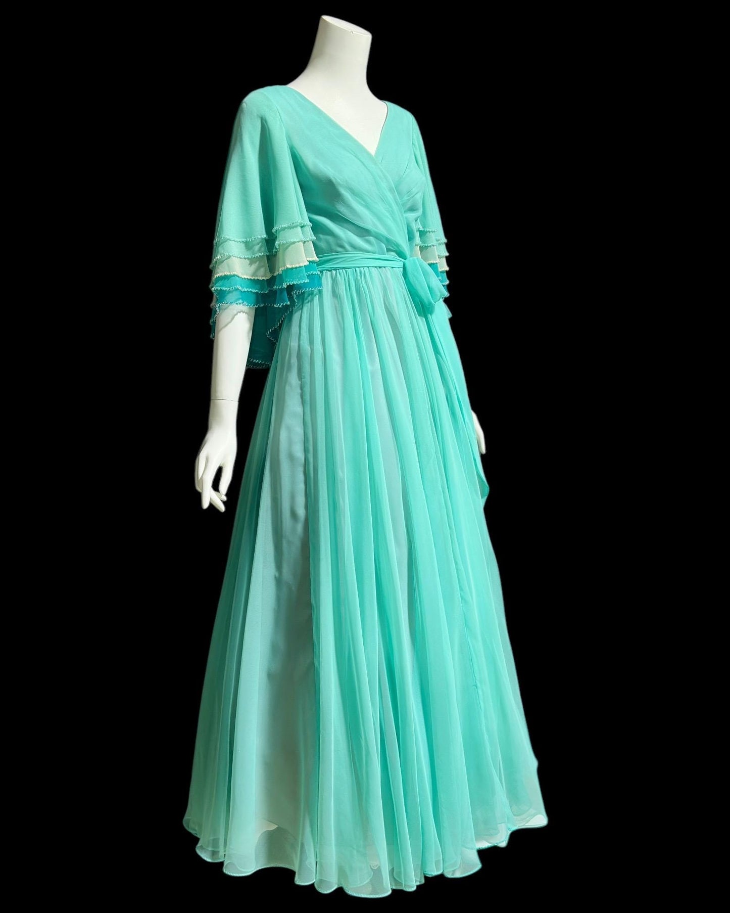 JACK BRYAN, vintage 1970s teal green chiffon evening dress with beaded flutter sleeves