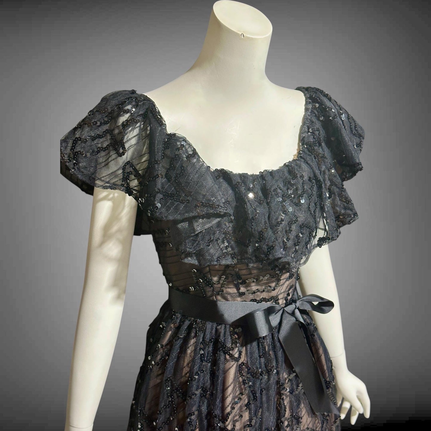 1970s vintage evening dress gown, black lace and sequin ruffled off the shoulder formal dress