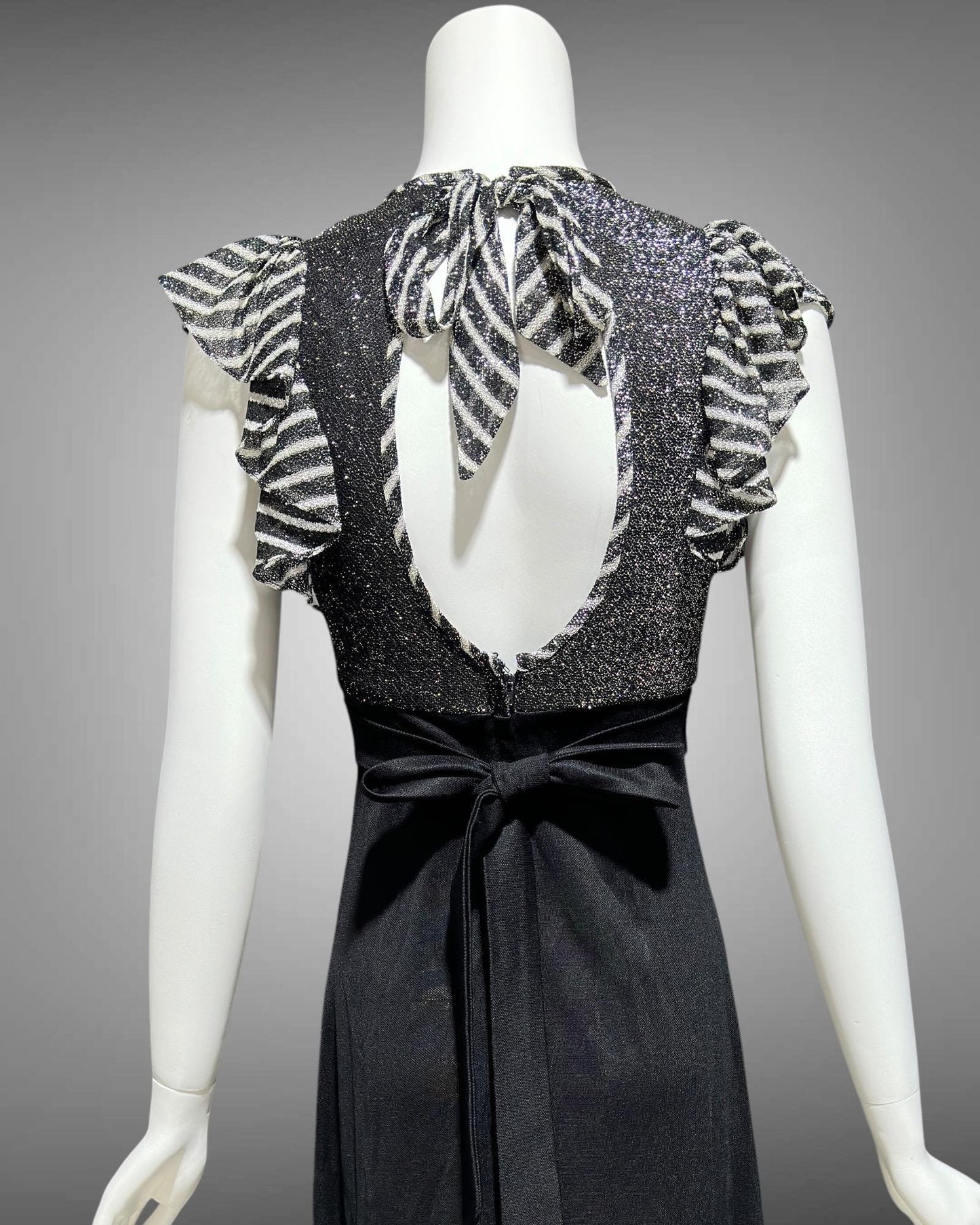 YOUNG INNOCENT by ARPEJA, 1970s vintage black jersey knit & lurex long dress