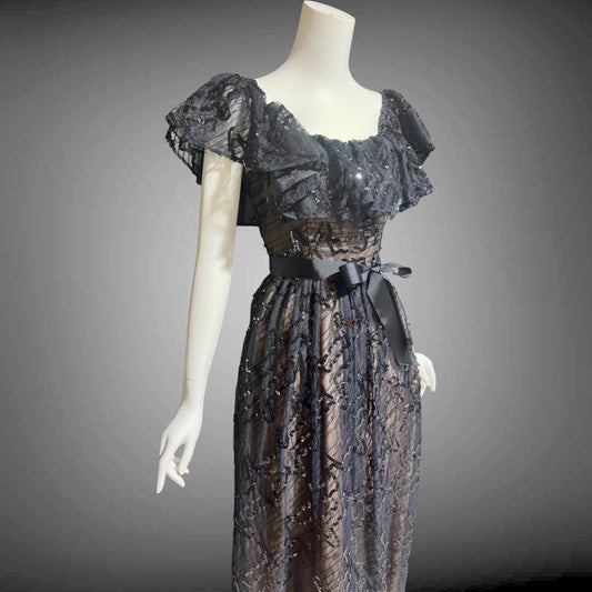 1970s vintage evening dress gown, black lace and sequin ruffled off the shoulder formal dress
