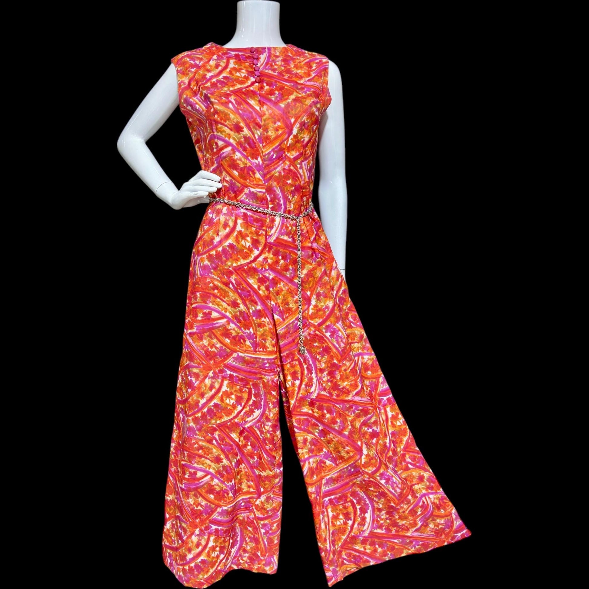 1960s vintage jumpsuit, wide leg flared palazzo pants, hot pink and orange paisley, sleeveless evening summer jumpsuit