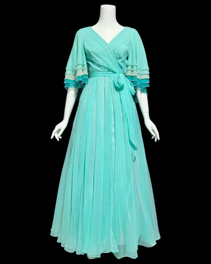 JACK BRYAN, vintage 1970s teal green chiffon evening dress with beaded flutter sleeves