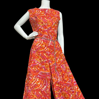 1960s vintage jumpsuit, wide leg flared palazzo pants, hot pink and orange paisley, sleeveless evening summer jumpsuit