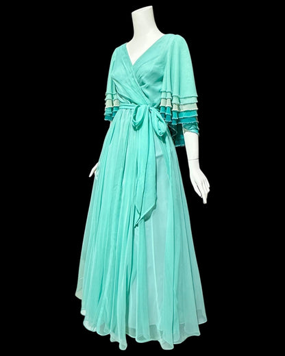 JACK BRYAN, vintage 1970s teal green chiffon evening dress with beaded flutter sleeves